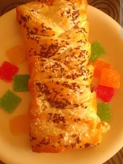 Una foto de Trenza de hojaldre con Nutella y virutas de chocolate