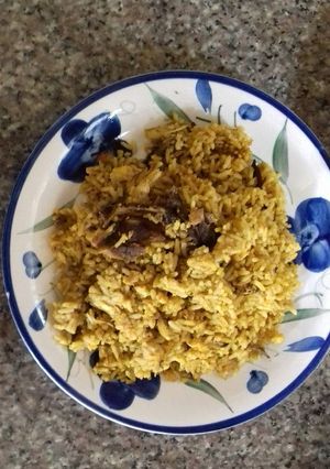 A picture of Banga rice,with dry fish.