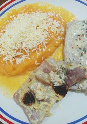 Una foto de Matambre con leche y puré de calabaza