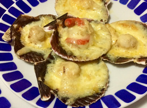 Una foto de Ostiones a la parmesana