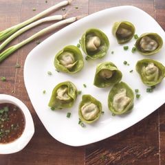 A picture of Spinach and Cottage Cheese Momos with Honey Chilli dip.