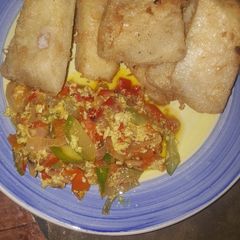 A picture of Fried yam wif egg sauce.