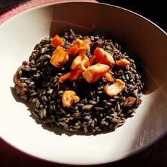 Foto di Risotto al nero di seppia e salmone