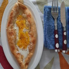 A picture of Khachapuri (Georgian cheese bread).