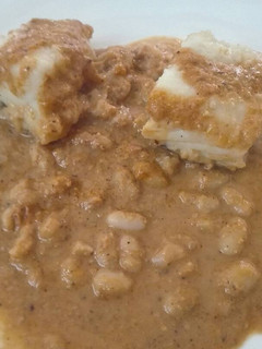 Una foto de Bacalao con romesco