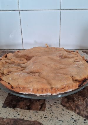 Una foto de Tarta agridulce de pollo y durazno con ciruelas pasas