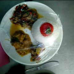 A picture of Plain boiled rice with carbonnade of beef and ratatouille.