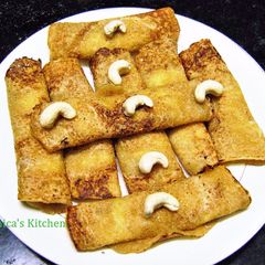 A picture of Pati Shapta Pithe (traditional Bengali Sweet).