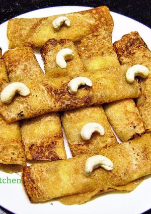 A picture of Pati Shapta Pithe (traditional Bengali Sweet).