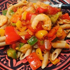 A picture of Shrimp and bell peppers penne.