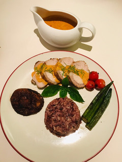 A picture of Roasted Pork Loin with Panang Sauce.
