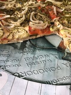 Una foto de Pizza vegetariana