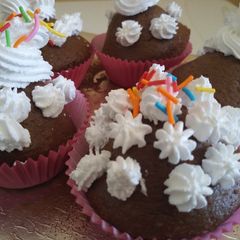 A picture of BlackForest Muffins With Whipping Cream.