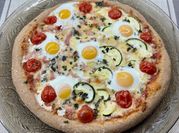 Una foto de pizza cherry y panceta