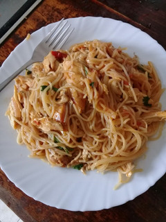 A picture of Leftover chicken with spaghetti.