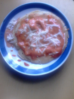 Una foto de Pizza-Arepas