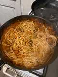 Spaghetti con tuco de albóndigas