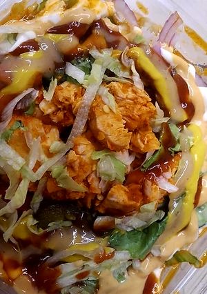 A picture of Chicken tikka salad.