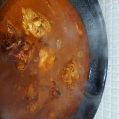 A picture of Rustic chicken curry.
