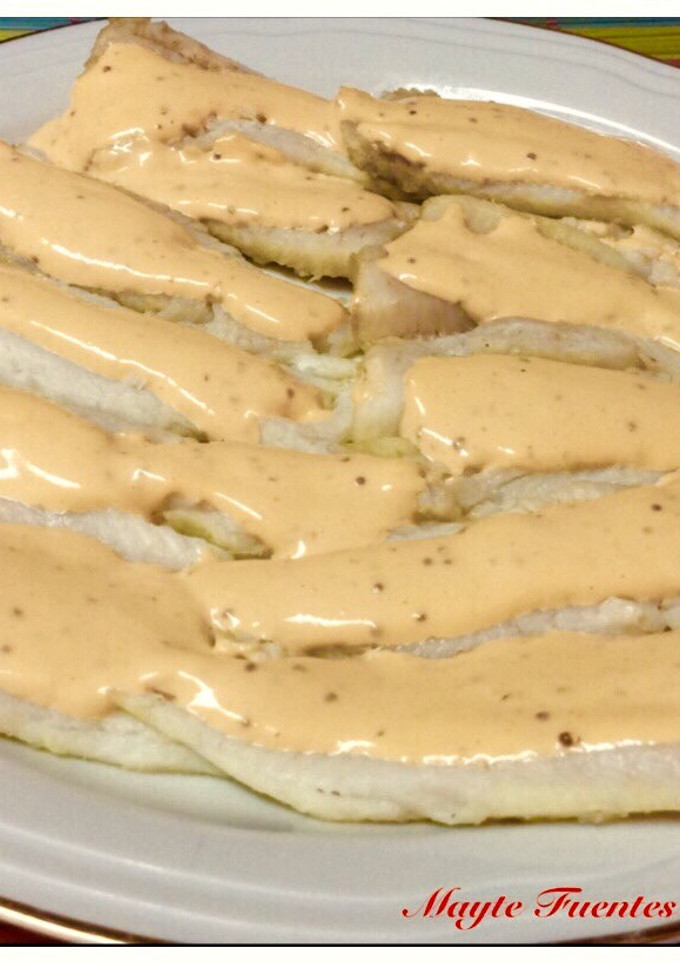 Una foto de Tronquitos de merluza con salsa rosa