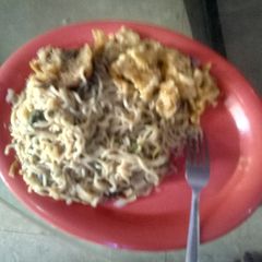 A picture of Spinach noodles with dry fish and scrambled eggs.