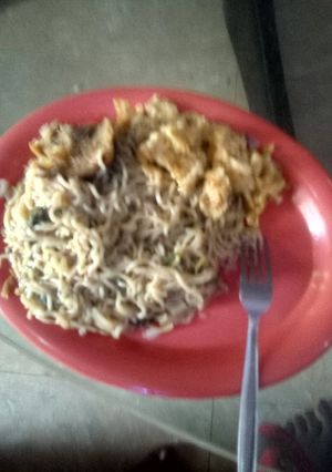 A picture of Spinach noodles with dry fish and scrambled eggs.