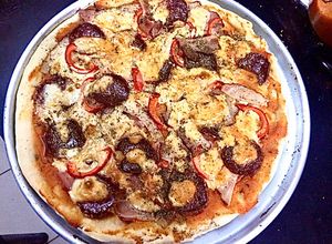 Una foto de Pizza la carnívora