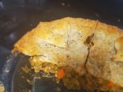 A picture of chicken pie with puff pastry