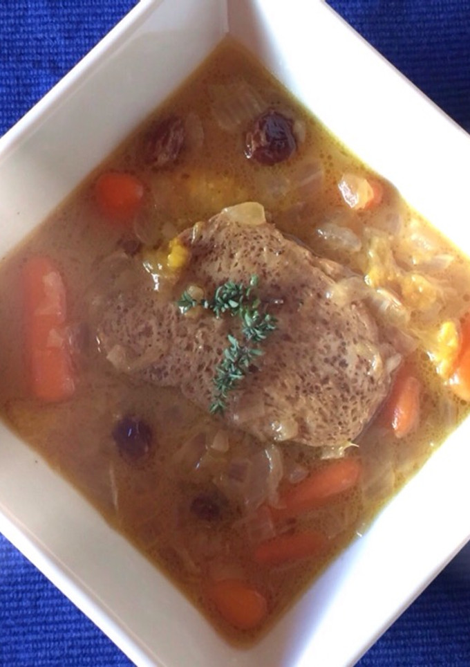 Una foto de Seitán de kamut con salsa de naranja