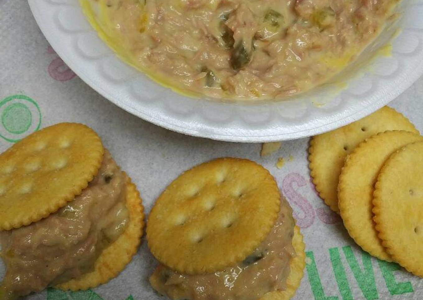Tuna salad on top of the cracker
