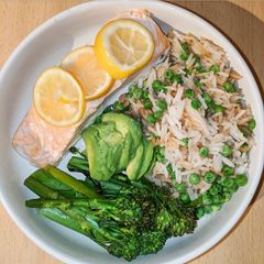 A picture of Lemon salmon with rice and tenderstem broccoli.