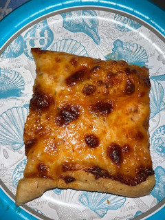 A picture of Thin crust paprika pizza.