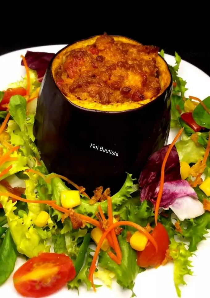 Una foto de Berenjena rellena de ternera y cerdo