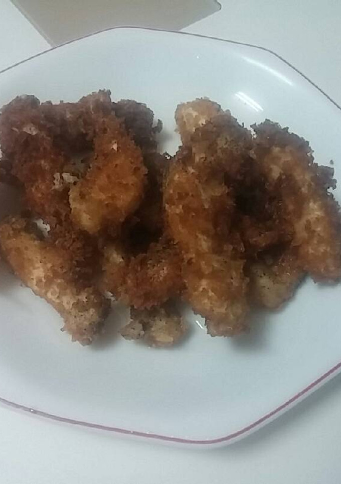 Una foto de 424.Pollo rebozado con kikos