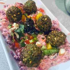 A picture of Sprouts Falafel in hung curd boat.