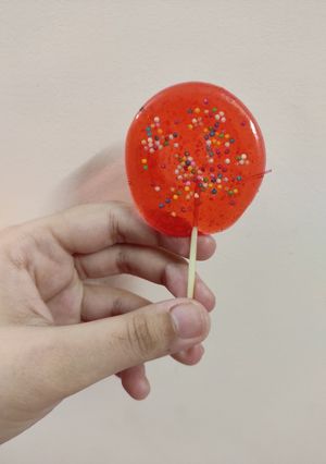 A picture of Orange lollies.