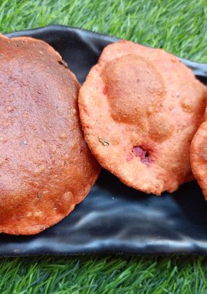 A picture of Leftover beetroot carrot tomato pulp poori.