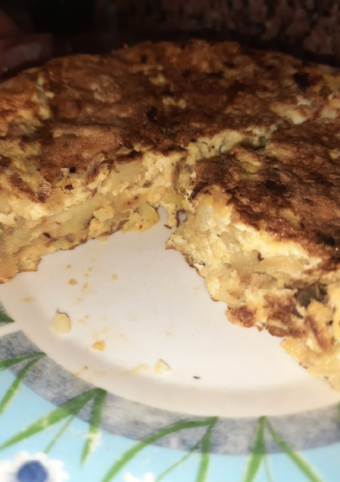 Una foto de Tortilla de patatas con cebolla