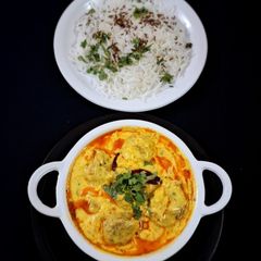 A picture of Panjabi Kadhi Pakora & Jira Rice.