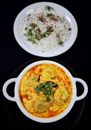 A picture of Panjabi Kadhi Pakora & Jira Rice.