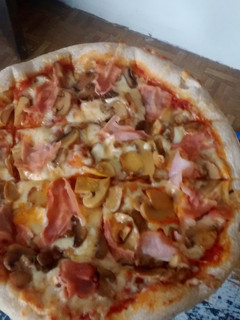 Una foto de Pizza Casera Estilo Italiano