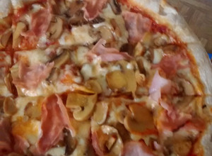 Una foto de Pizza Casera Estilo Italiano