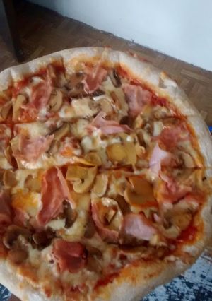 Una foto de Pizza Casera Estilo Italiano