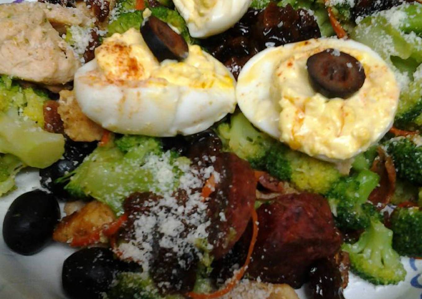 Buttery broccoli salad topped with deviled eggs