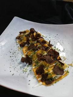 Foto di Ravioloni di finocchi gratinati e tartufo uncinato