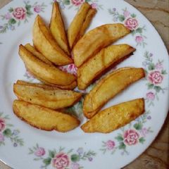 Potato wedges🥔🍟 A picture of Potato wedges🥔🍟.
