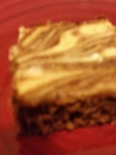 A picture of Cheese cake brownies.