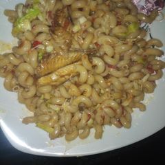 A picture of Macaroni jallof with scarcy cavage.