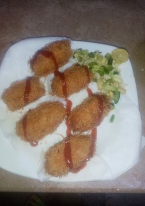 A picture of Crispy Potatoes with stuffed rice.