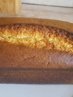 Una foto de Budín de coco con dulce de leche